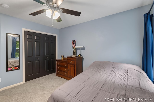 13462 Ravine View Dr, Grand Haven, MI 49417 - carpeted bedroom featuring a closet and a ceiling fan
