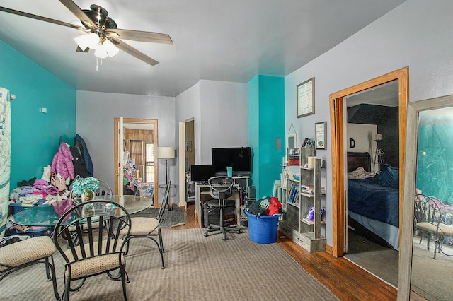 54 Wren St, Battle Creek, MI 49017 - bedroom featuring wood finished floors, a ceiling fan, and an office area