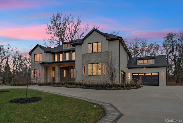 4627 Cimarron Dr, Bloomfield Hills, MI 48302 - contemporary house featuring stone siding, curved driveway, a yard, and an attached garage