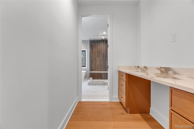 4627 Cimarron Dr, Bloomfield Hills, MI 48302 - full bathroom with vanity, a freestanding bath, wood finished floors, and a shower