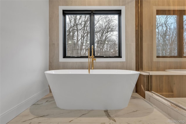 4627 Cimarron Dr, Bloomfield Hills, MI 48302 - full bath with a soaking tub, marble finish floors, and plenty of natural light