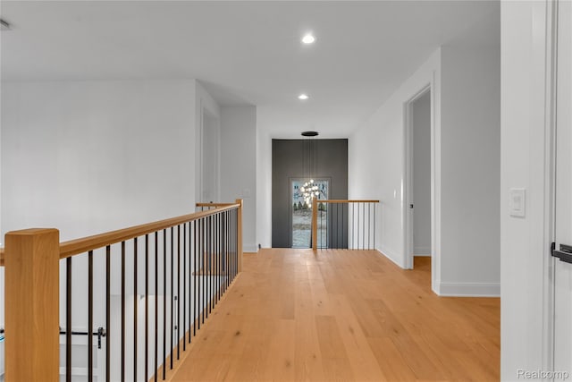 4627 Cimarron Dr, Bloomfield Hills, MI 48302 - hallway featuring wood finished floors, recessed lighting, and an upstairs landing