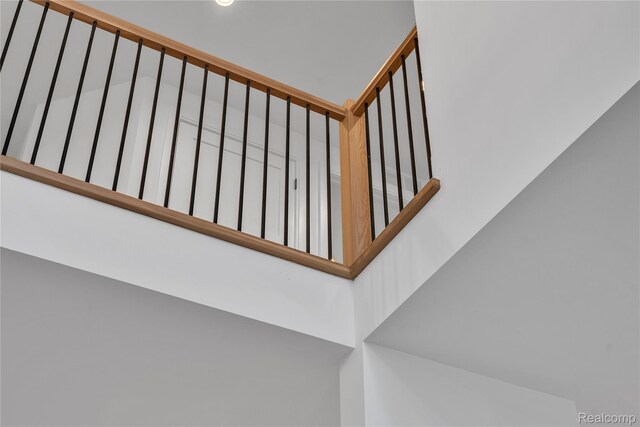 4627 Cimarron Dr, Bloomfield Hills, MI 48302 - staircase featuring recessed lighting