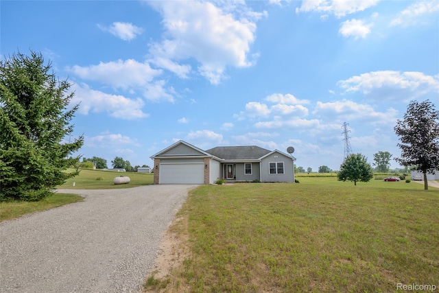 16017 Whippoorwill Ct, Manchester, MI 48158 - ranch-style house featuring gravel driveway, a garage, and a front lawn