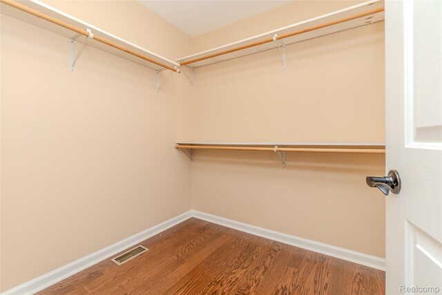 16017 Whippoorwill Ct, Manchester, MI 48158 - walk in closet featuring wood finished floors