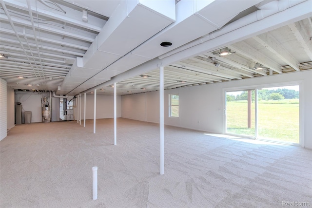 16017 Whippoorwill Ct, Manchester, MI 48158 - basement with water heater and carpet flooring