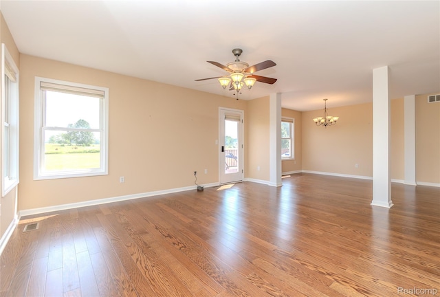 16017 Whippoorwill Ct, Manchester, MI 48158 - unfurnished room with a chandelier, a ceiling fan, and wood finished floors