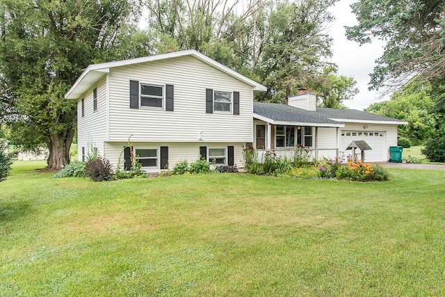 12345 Beadle Lake Rd, Battle Creek, MI 49014 - split level home with an attached garage, a front lawn, and a chimney