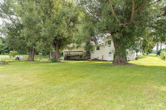 12345 Beadle Lake Rd, Battle Creek, MI 49014 - view of green lawn featuring a wooden deck