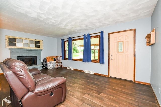 12345 Beadle Lake Rd, Battle Creek, MI 49014 - living area with wood finished floors and a fireplace