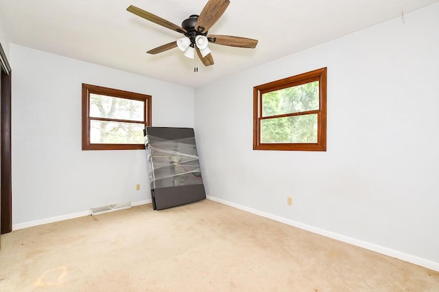 12345 Beadle Lake Rd, Battle Creek, MI 49014 - unfurnished bedroom featuring carpet and ceiling fan