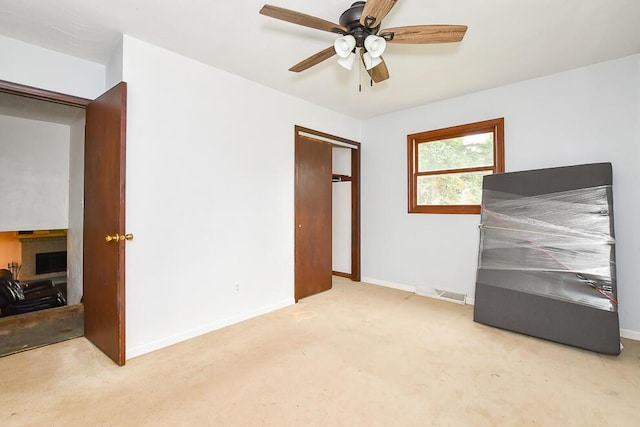 12345 Beadle Lake Rd, Battle Creek, MI 49014 - unfurnished bedroom featuring carpet and a ceiling fan