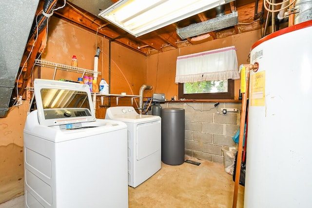 12345 Beadle Lake Rd, Battle Creek, MI 49014 - laundry room with water heater, washer and clothes dryer, and concrete block wall