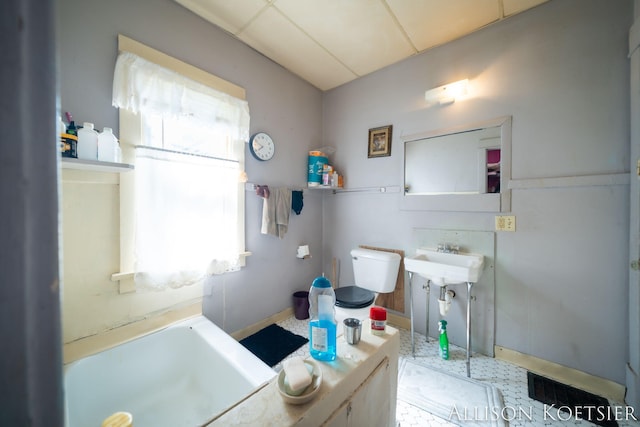 945 Kalamazoo Ave SE, Grand Rapids, MI 49507 - bathroom with plenty of natural light and a bath
