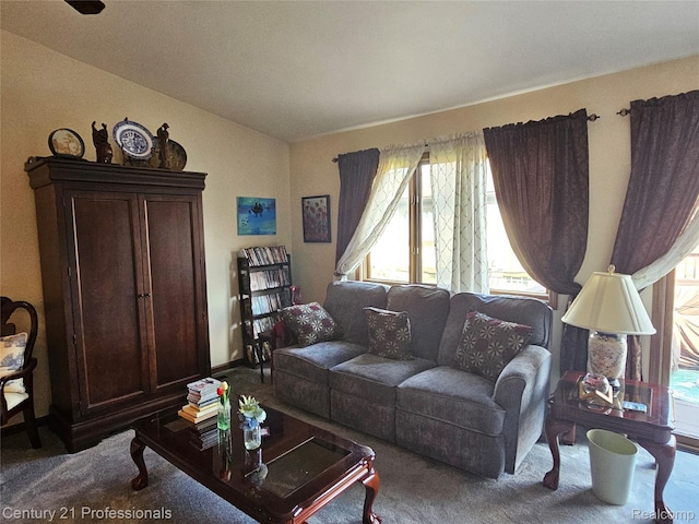 4866 Elm Tree Ln, Warren, MI 48092 - living area featuring carpet, healthy amount of natural light, and lofted ceiling