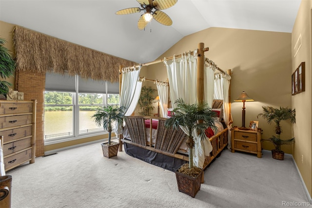 24065 Timber Creek Ln, Flat Rock, MI 48134 - carpeted bedroom with vaulted ceiling, a ceiling fan, and a water view