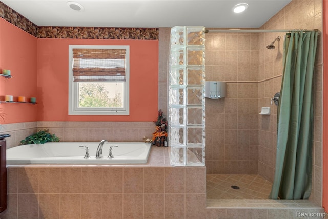 24065 Timber Creek Ln, Flat Rock, MI 48134 - bathroom featuring a tile shower and a garden tub