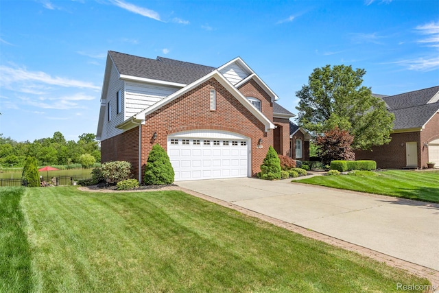 24065 Timber Creek Ln, Flat Rock, MI 48134 - traditional home featuring brick siding, concrete driveway, and a garage