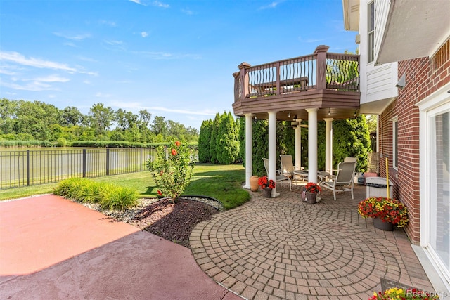 24065 Timber Creek Ln, Flat Rock, MI 48134 - patio / terrace featuring a patio area, a fenced backyard, a water view, and view of scattered trees