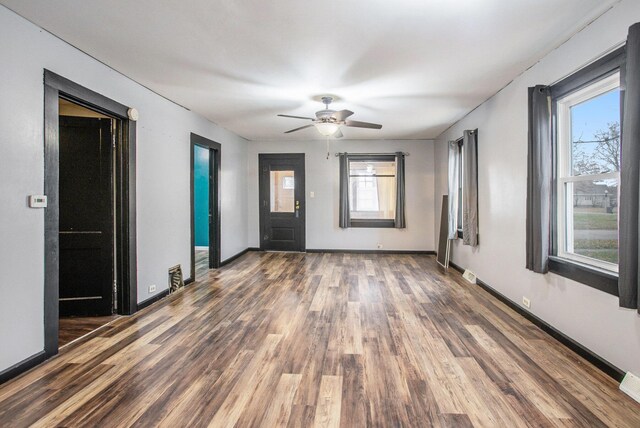 404 Susan Ave, Sturgis, MI 49091 - unfurnished room with plenty of natural light, wood finished floors, and ceiling fan