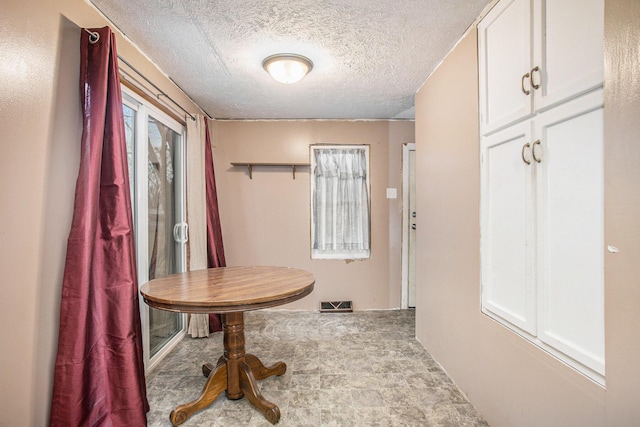 404 Susan Ave, Sturgis, MI 49091 - hall featuring a textured ceiling