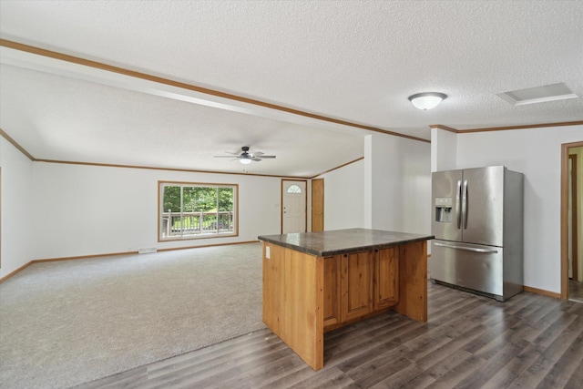 19905 N Ave, Battle Creek, MI 49017 - kitchen featuring stainless steel refrigerator with ice dispenser, dark wood-type flooring, crown molding, dark countertops, and a ceiling fan