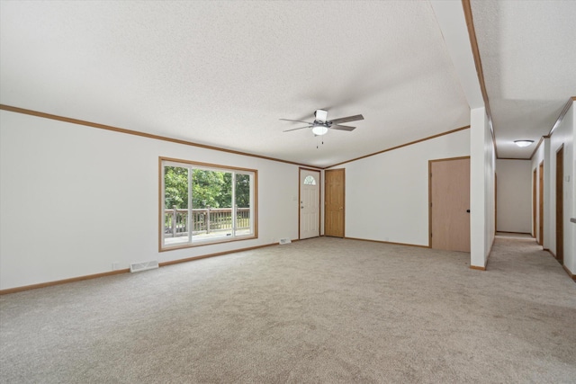19905 N Ave, Battle Creek, MI 49017 - unfurnished room featuring a ceiling fan, vaulted ceiling, light colored carpet, crown molding, and a textured ceiling