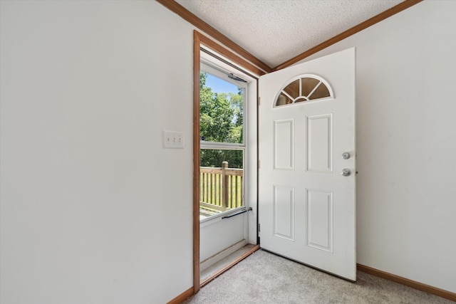 19905 N Ave, Battle Creek, MI 49017 - entryway with ornamental molding, light carpet, and a textured ceiling