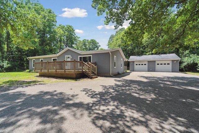 19905 N Ave, Battle Creek, MI 49017 - view of front of property with an outbuilding, a deck, and a garage