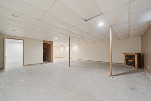 19905 N Ave, Battle Creek, MI 49017 - finished basement featuring stairs, a lit fireplace, a paneled ceiling, and recessed lighting