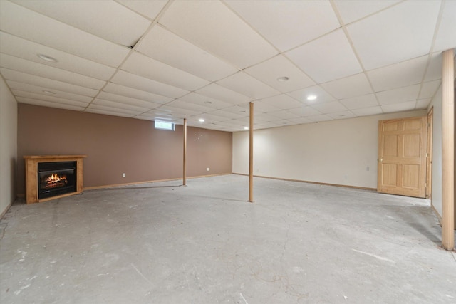 19905 N Ave, Battle Creek, MI 49017 - below grade area featuring a warm lit fireplace, a paneled ceiling, and recessed lighting