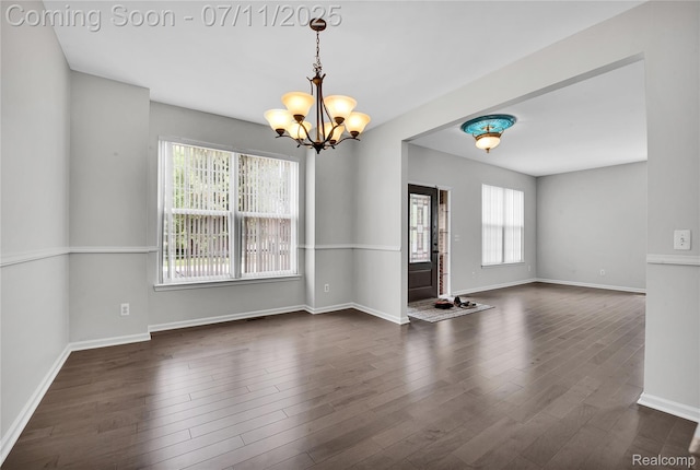 3454 Everett Dr, Rochester Hills, MI 48307 - empty room with a chandelier and dark wood finished floors