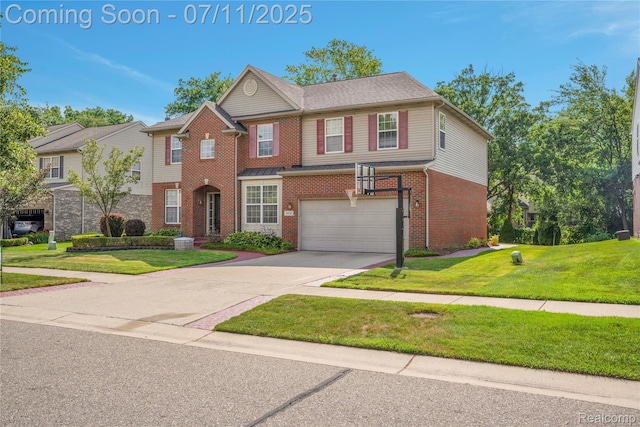 3454 Everett Dr, Rochester Hills, MI 48307 - view of front of property featuring brick siding, an attached garage, concrete driveway, and a front lawn