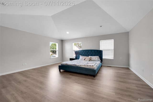 3454 Everett Dr, Rochester Hills, MI 48307 - bedroom with lofted ceiling and wood finished floors