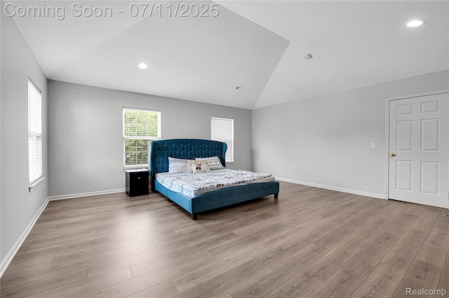 3454 Everett Dr, Rochester Hills, MI 48307 - bedroom with lofted ceiling, wood finished floors, and recessed lighting