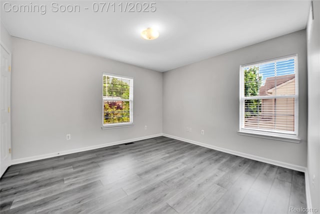 3454 Everett Dr, Rochester Hills, MI 48307 - empty room featuring wood finished floors and baseboards