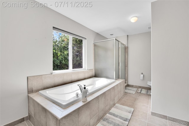 3454 Everett Dr, Rochester Hills, MI 48307 - bathroom with a bath, a stall shower, and tile patterned flooring
