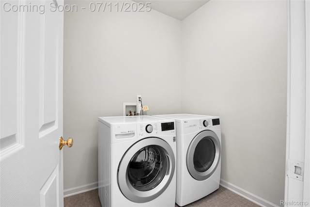 3454 Everett Dr, Rochester Hills, MI 48307 - laundry room with washing machine and clothes dryer and baseboards