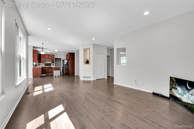 3454 Everett Dr, Rochester Hills, MI 48307 - unfurnished living room featuring dark wood-type flooring and recessed lighting