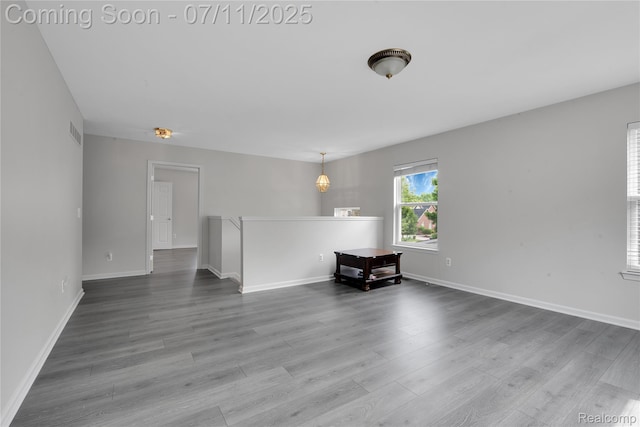 3454 Everett Dr, Rochester Hills, MI 48307 - spare room with wood finished floors and baseboards