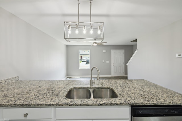 180 Ash St, Corunna, MI 48817 - kitchen featuring dishwasher, light stone counters, white cabinetry, and wood finished floors