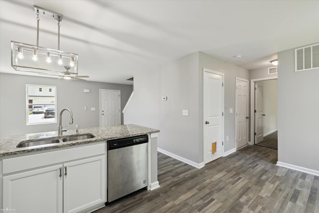 180 Ash St, Corunna, MI 48817 - kitchen with stainless steel dishwasher, ceiling fan, dark wood-style flooring, white cabinetry, and light stone countertops