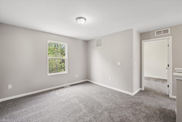 180 Ash St, Corunna, MI 48817 - unfurnished room featuring carpet and baseboards