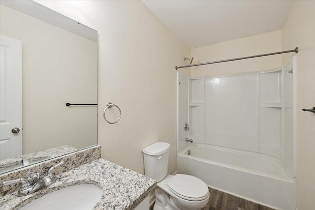 180 Ash St, Corunna, MI 48817 - bathroom with wood finished floors, vanity, and shower / bathtub combination