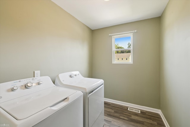 180 Ash St, Corunna, MI 48817 - laundry room with washer and clothes dryer and wood finished floors