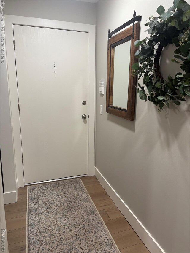 1975 Michigan Ave Unit 47, Marysville, MI 48040 - entryway featuring light wood-type flooring and baseboards