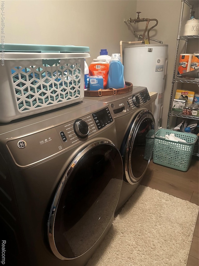 1975 Michigan Ave Unit 47, Marysville, MI 48040 - laundry room featuring washing machine and clothes dryer and electric water heater