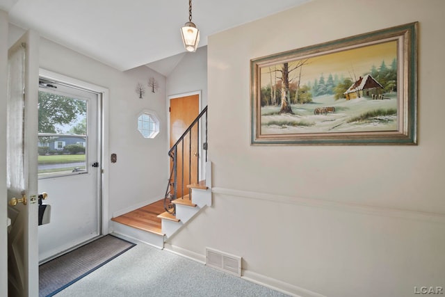 608 Brook St, Tecumseh, MI 49286 - foyer with stairway, carpet, and lofted ceiling