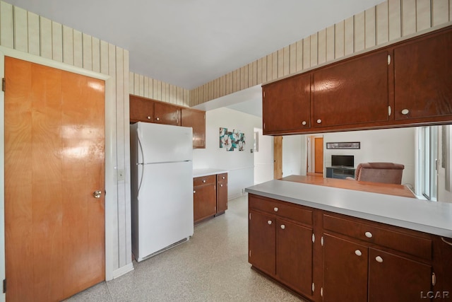 608 Brook St, Tecumseh, MI 49286 - kitchen featuring freestanding refrigerator and light countertops