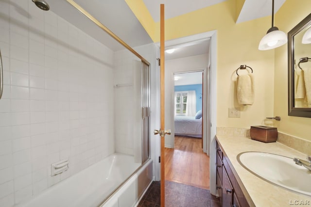 608 Brook St, Tecumseh, MI 49286 - ensuite bathroom with vanity and combined bath / shower with glass door